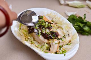 酱蒸鱼肉,上锅蒸10分钟。出锅放上<a style='color:red;display:inline-block;' href='/shicai/ 131'>香菜</a>小葱碎,另起一小锅,烧一勺热油,将酱料和菜碎激香。