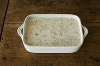 土豆千层派,倒入奶汁,送入预热好的烤箱,180度烤一小时,几乎收干即可