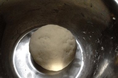 香菇猪肉灌汤蒸饺,盖盖静置半小时;