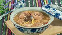 黄豆猪蹄汤,最后放入1勺半盐, 淋入味极鲜, 盖上锅盖 , 继续煮10分钟 , 即可装入汤碗上桌!