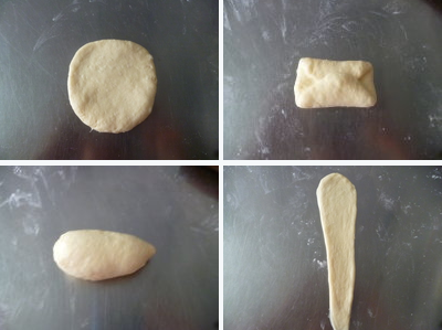 奶油面包卷~~~松软可口 ,小面团擀开成圆形后自上下三分之一处往内折，再对折后压紧接口处，再搓成一头粗一头细的水滴形继续松弛5～10分钟（利用松弛的时间依次做完其余的面团）。