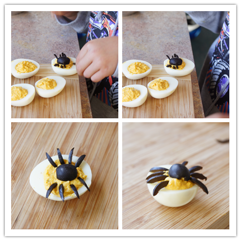 跟孩子做惊悚又美味的蜘蛛蛋——Spider Eggs ,把半个黑橄榄放置在鸡蛋中央,然后给蜘蛛插上8条腿,Job done!