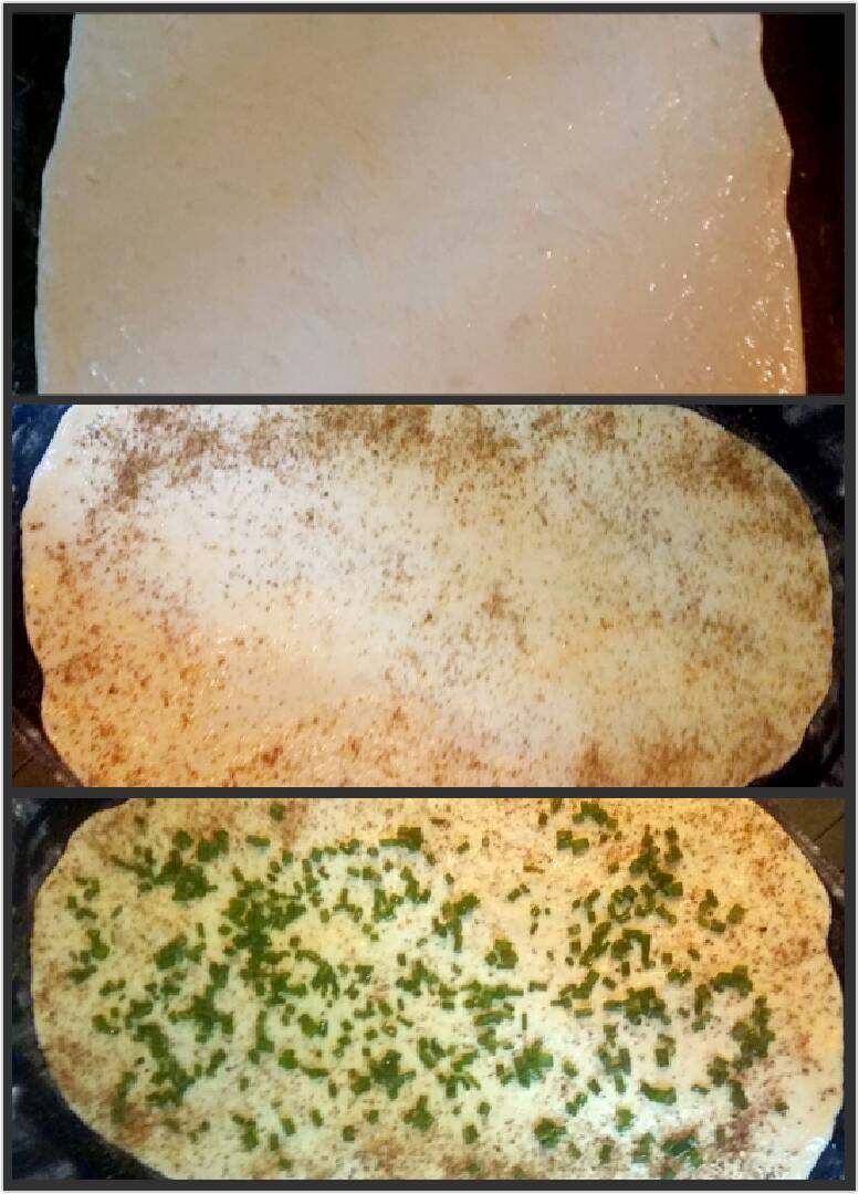 虾皮肉末葱花包子,面团用擀面杖擀成长方行,滴上色拉油抹均匀,撒上椒盐均匀的撒上葱花