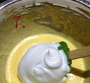 酸奶蛋糕——夏日下午茶精选,先取1/3到加入蛋黄糊中，二者翻拌均匀；