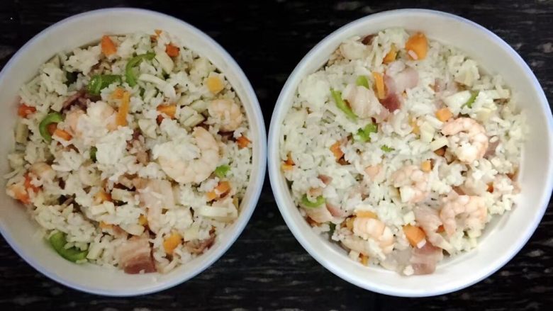 鲜虾🍤培根🐖焗饭🧀,热锅热油加蒜末爆香，放入<a style='color:red;display:inline-block;' href='/shicai/ 443'>培根</a>翻炒片刻，炸出猪油，放入剥皮的<a style='color:red;display:inline-block;' href='/shicai/ 301'>鲜虾</a>炒片刻，接下去把各种菜放入，等虾变红，放入米饭，将材料炒匀，放入适量盐，盛出。