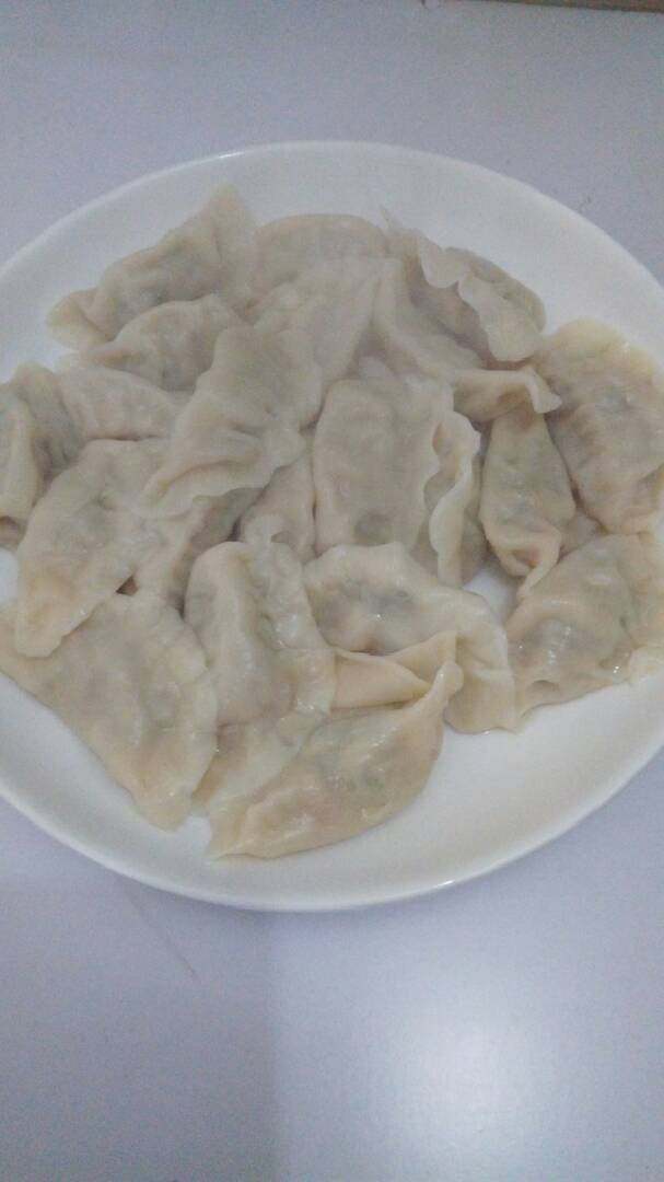 兰花饺子十#乐享双节#,关火:捞出装盘,即成,Ok。