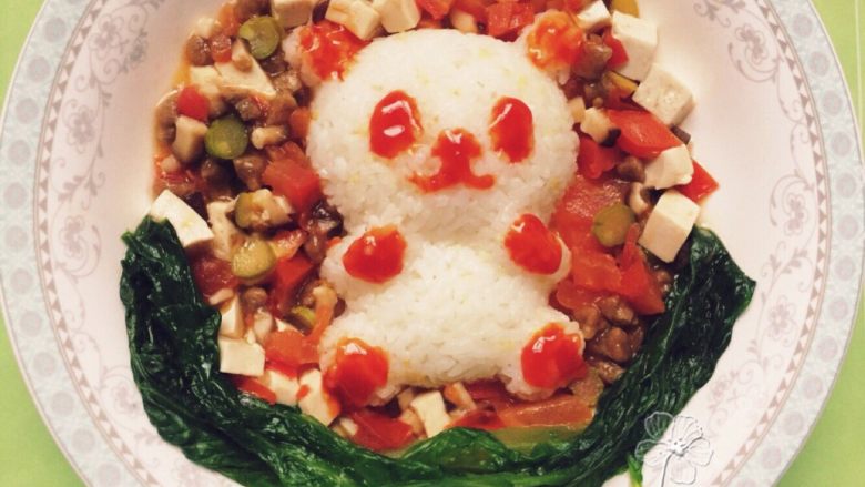 宝宝创意餐--番茄豆腐牛肉饭,摆上菜叶,画上<a style='color:red;display:inline-block;' href='/shicai/ 699'>番茄酱</a>。