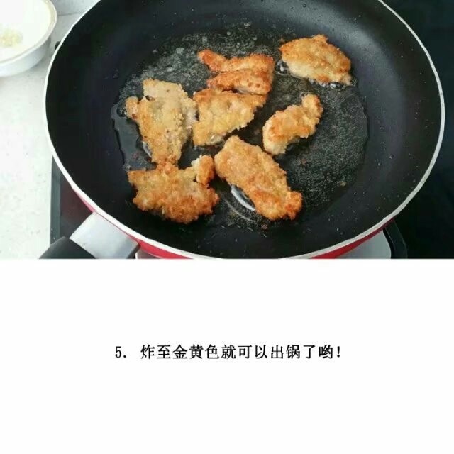 蒜香炸鸡块。,炸到金黄色，出锅控油。