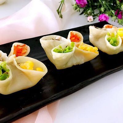 四喜饺子,让生活喜气洋洋,淋上香料。