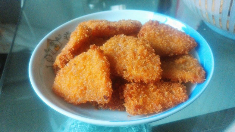 冬瓜排,炸成金黄色出锅,加入适量的炼奶味道更佳