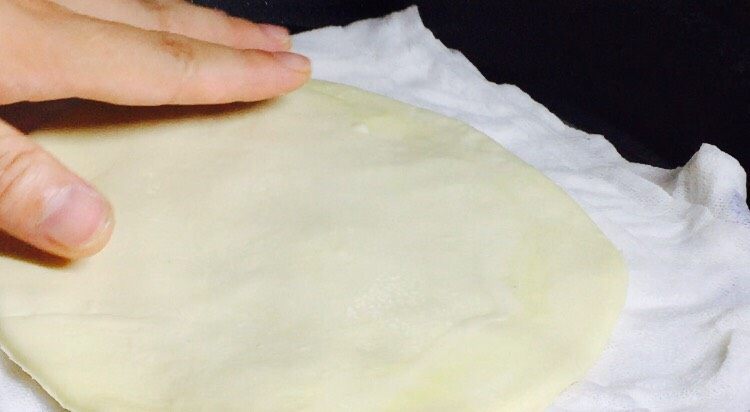福袋黄金饭,下面垫布(防止粘连)放上面皮,冷水下锅,大火蒸10分钟