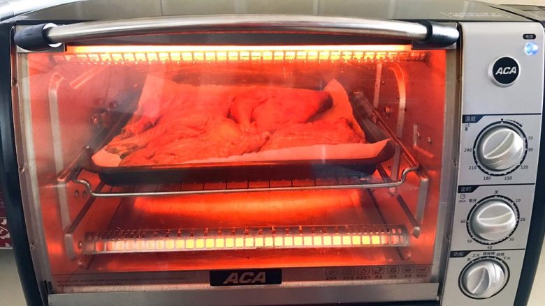 私房蜜汁鸭腿饭,再把烤盘放入烤箱,200度再烤5分钟