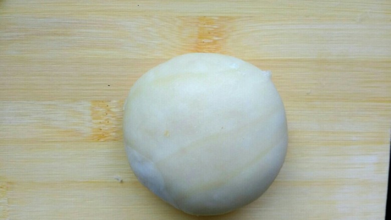 肉馅烧饼,收口向下，包好