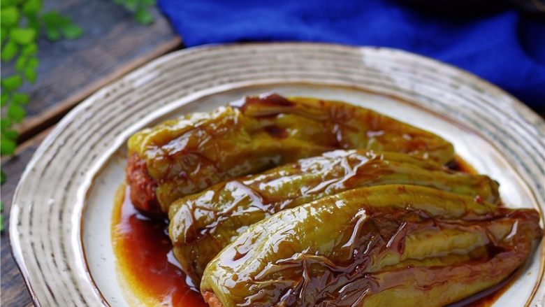 糖醋青椒酿肉,关火,起锅。【糖醋青椒酿肉】做好啦。