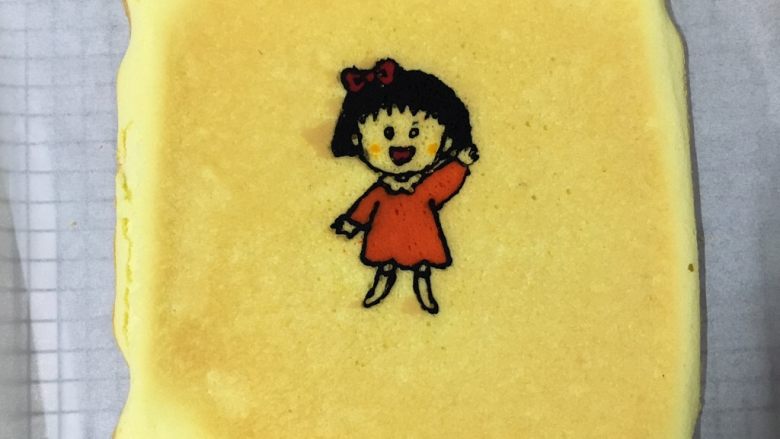 樱桃小丸子蛋糕卷,轻撕开硅胶垫,放凉。