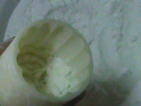 芒果椰蓉冰皮月饼,月饼模中装入少量熟<a style='color:red;display:inline-block;' href='/shicai/ 520'>糯米粉</a>,摇晃均匀后倒出