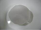 虾饺皇,置于容器里,以湿布遮盖,醒10分钟左右;