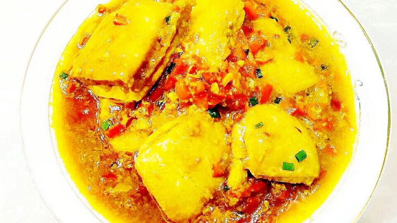 汤汁肉夹豆腐,然后再把锅里的汤汁浇上去。味道真的好的不要不要的。