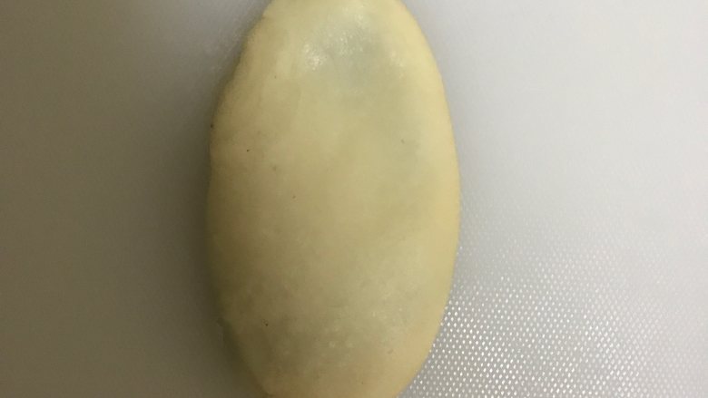 蔓越莓糯米老婆饼(酥饼),做好收口向下放入烤盘,用手掌轻轻的压扁一点