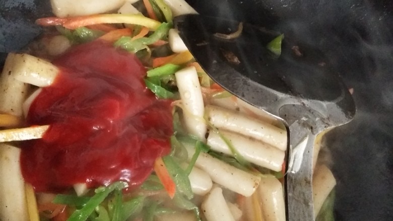 炒年糕,可以放适量不一定放全