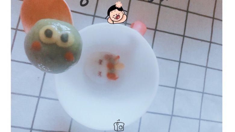 草稿1519690510,10.放在小碗里的卡通汤圆 。可爱吗?