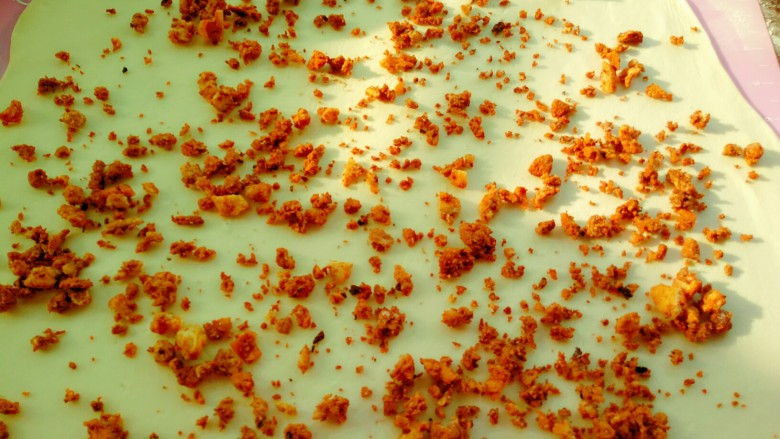 油梭子饼,撒上油渣