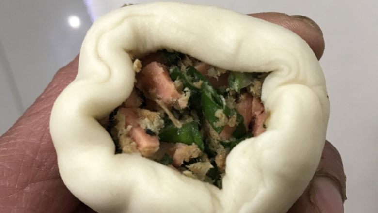 黃桥烧饼,用虎口慢慢收口