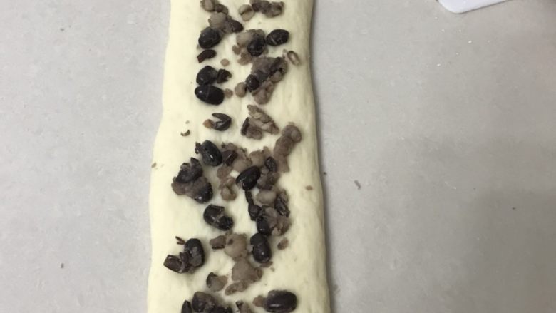 中种蜜豆吐司(玉米油板)
,用手掌轻轻按在一下。