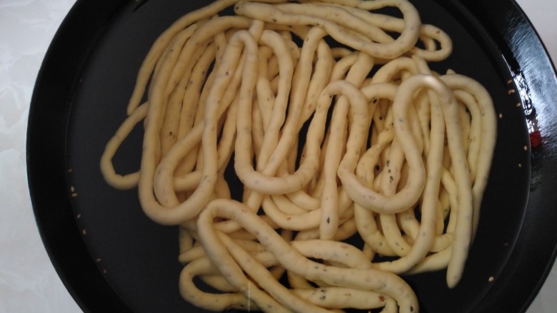 撒子,泡在油里面醒发3小时以上,我着急吃,醒发了1小时。