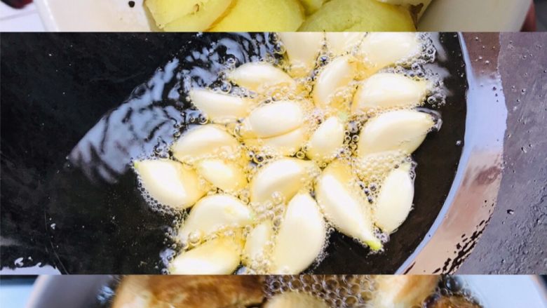 塔吉锅酱焖三鲜,蒜分两半一半和姜片放在一起留着炝锅,另一部分入凉油锅炸香成金黄色倒出备用
