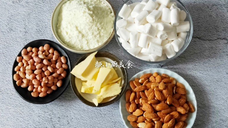 花生杏仁牛轧糖,首先把所有食材都准备好,全部都秤好。