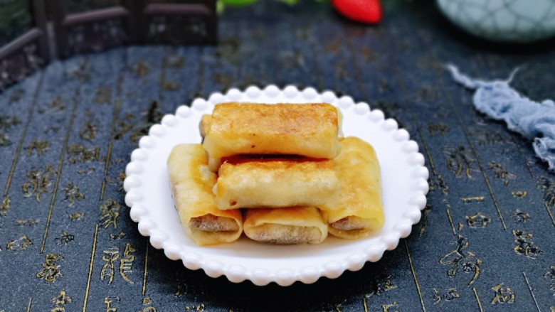 快手早餐~少油版香煎肉松春卷,快手早餐~搭配一杯牛奶,营养美味。