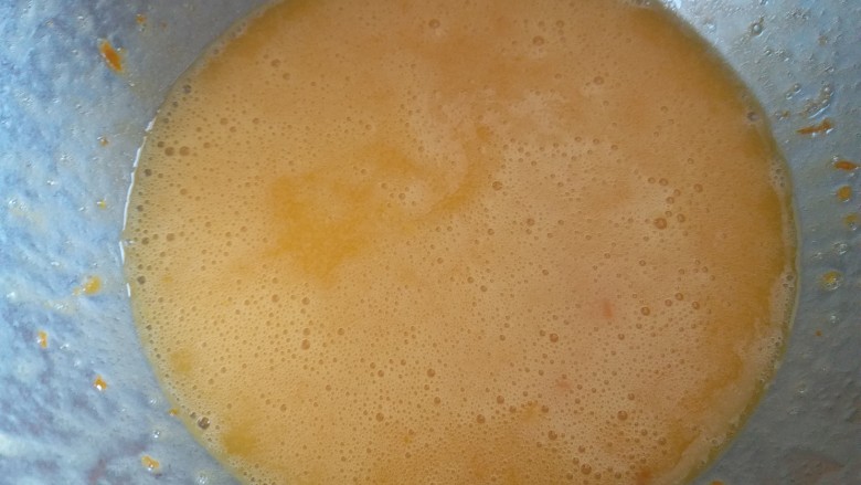 橙香甜甜圈(植物油版),再次用手动打蛋器搅拌均匀。