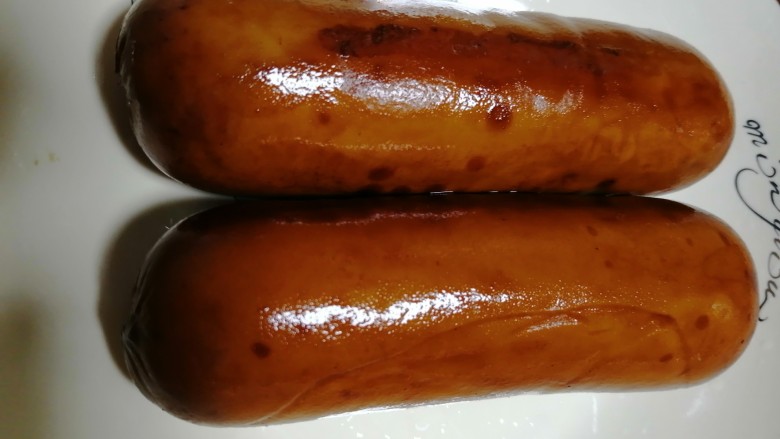 拌捆鸡,将两根捆鸡洗干净,切成薄片