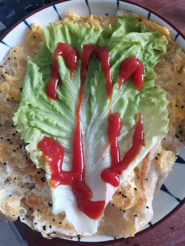 手抓饼,放番茄酱