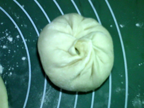 梅干菜烧饼,用包包子的方法包好,