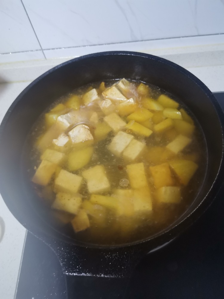 豆腐炖藕片,加莫过豆腐的水