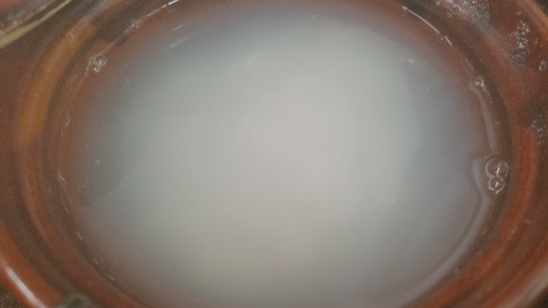 鸡肉山药粥,再用大火煮开撇去浮沫