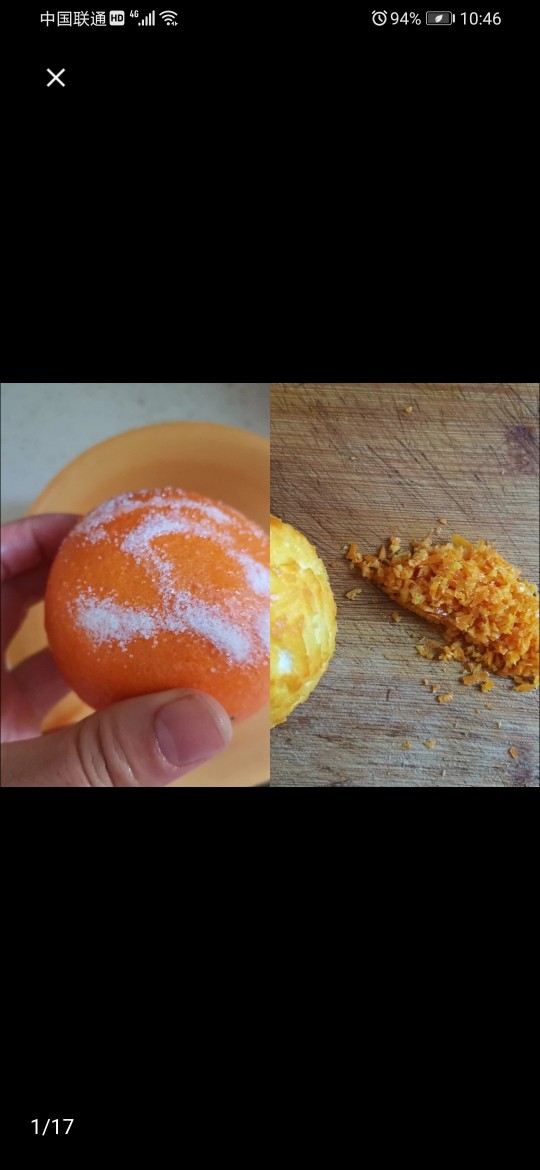 橙子蛋糕,橙子上撒少许盐,用手搓洗干净,然后用擦丝器擦掉橙子皮,再切碎后加少许白砂糖腌制片刻
