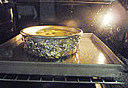 冰蓝莓芝士,烤箱预热150°,烘烤40分钟后转160°烘烤20分钟,烘烤结束后不开烤箱门焖30分钟再取出,放入冰箱冷藏一夜至透方可脱模,切块,表面用<a style='color:red;display:inline-block;' href='/shicai/ 2868'>蓝莓酱</a>装饰即可。