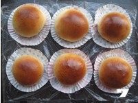 柔软可爱小面包——【肉松海苔小狮子面包】,放入预热的烤箱160度烤12分钟。(根据不同烤箱调节时间,上色后加盖锡纸)