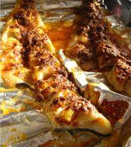 烤鱼,调料均匀涂到鱼身，烤箱预热230C，烤15-20min 至表面略焦