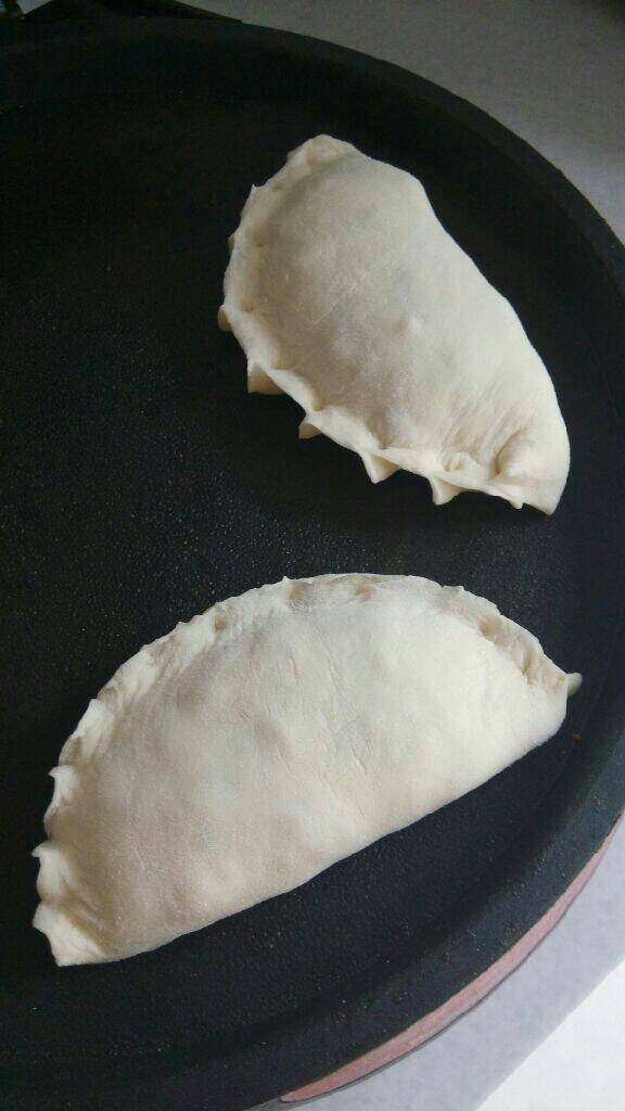 菠菜盒子,放入电饼铛或者平底锅中烙