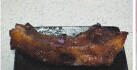 红酒焙肉 ,用筷子插入猪颈肉,轻松插入便转200°,烤10分钟左右观察上色程度