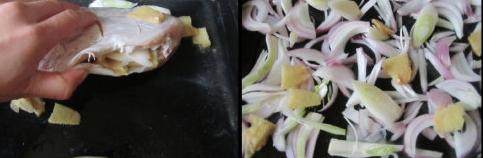 焦香烤鱼,鱼腌好后,部分姜片和大葱放入鱼腹中, 其他的也铺进烤盘中;