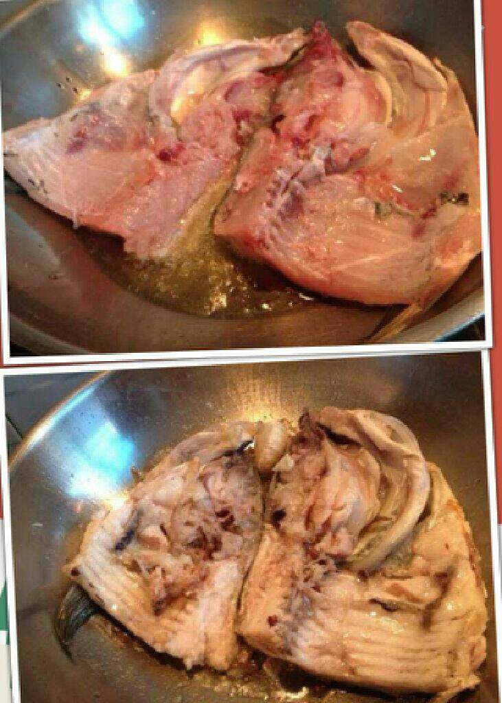 奶白浓香豆腐鲢鱼头汤,热锅放油放入鱼煎的金黄色