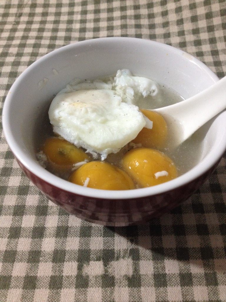 南瓜黑芝麻汤圆,如图可以加入鸡蛋,我放醪糟,