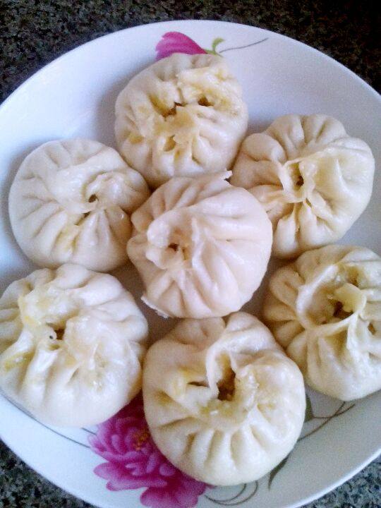 酸菜肉馅包子,锅上汽后,蒸20分钟,焖5分钟即可出锅。